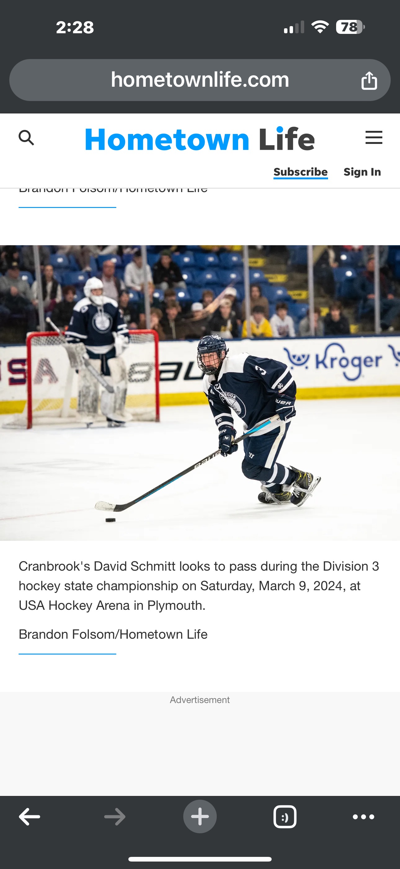 David Schmitt looks to pass during the Division 3 hockey state championship.